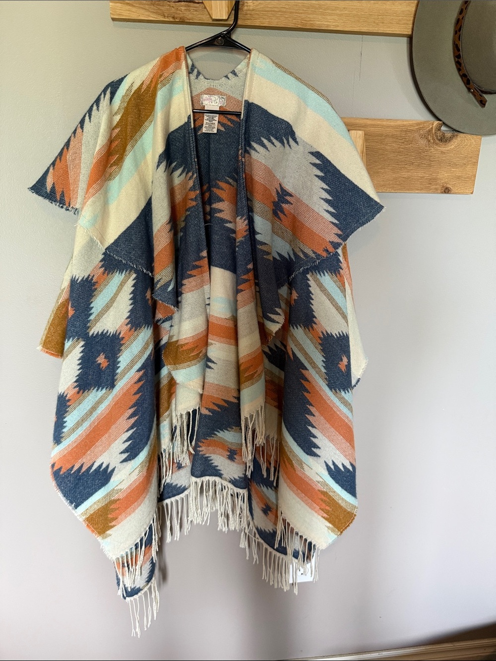Free People Aztec Fringe pancho in Blue, Rust & Cream
